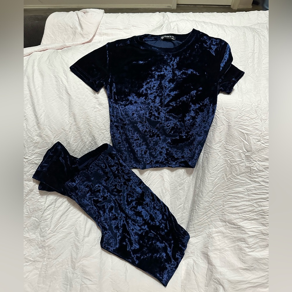 A dark blue velvet soft fabric shirt and pants.